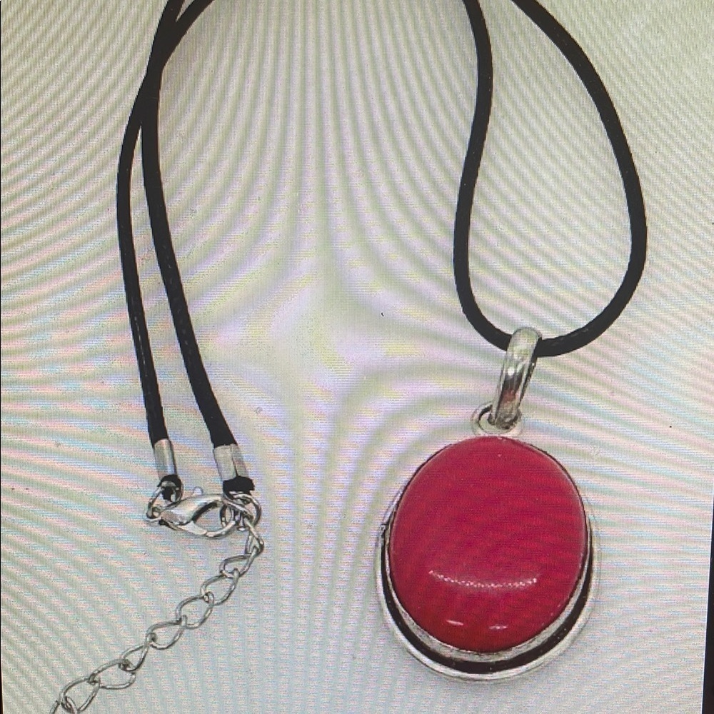 Elegant Silver Necklace with Vibrant Red Pendant